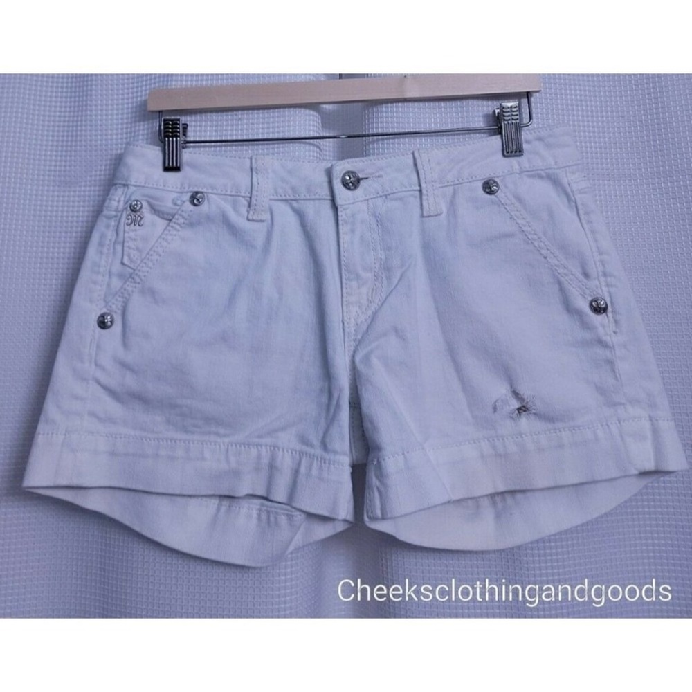 Miss Me White Shorts size 30 small stain in the front. Bought here didn't fit.